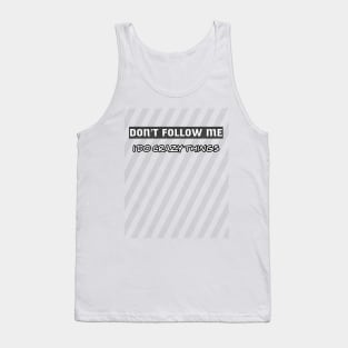 DON'T FOLLOW ME I DO CRAZY THINGS Tank Top